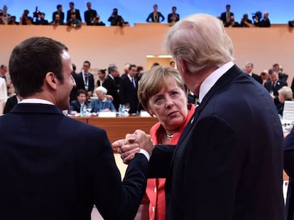 Donald Trump, Emmanuel Macron y Angela Merkel en la reciente reuni&oacute;n del G20 en Hamburgo.