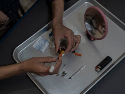 A man prepares a dose of fentanyl in Tijuana.