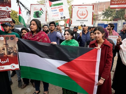 Pakistani people hold placards during a protest against Israeli airstrikes and to show solidarity with Palestinian people in Gaza, in Lahore, Pakistan, Saturday, Feb. 3, 2024.
