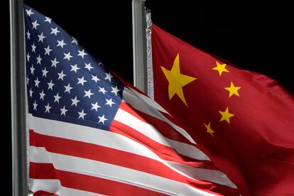 The American and Chinese flags wave at Genting Snow Park ahead of the 2022 Winter Olympics