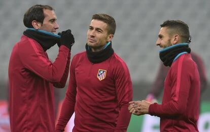 Godín, Gabi y Koke, en el Allianz Arena.