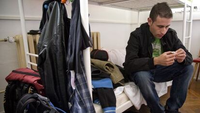 One of the Spaniards drawn to Germany by the promise of work, in the bunkhouse at Erfurt.