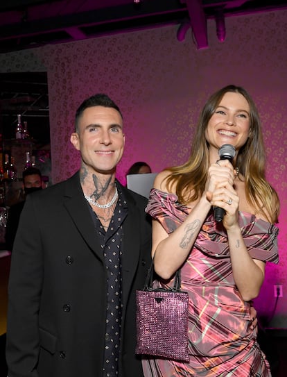 Adam Levine and his wife, Behati Prinsloo, at a party in Los Angeles. 
