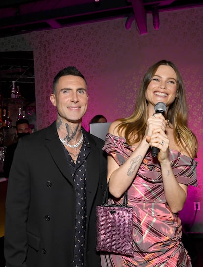 Adam Levine and his wife, Behati Prinsloo, at a party in Los Angeles.