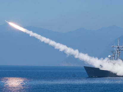 A Cheng Kung class frigate fires an anti air missile as part of a navy demonstration in Taiwan's annual Han Kuang exercises off the island's eastern coast near the city of Yilan, Taiwan on Tuesday, July 26, 2022. The Taiwanese capital Taipei staged a civil defense drill Monday and Tsai on Tuesday attended the annual Han Kuang military exercises, although there was no direct connection with tensions over a possible Pelosi visit. (AP Photo/Huizhong Wu)