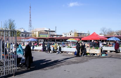 Dozens of people shop in the central market of Severodonetsk, on October 31, 2023. 

