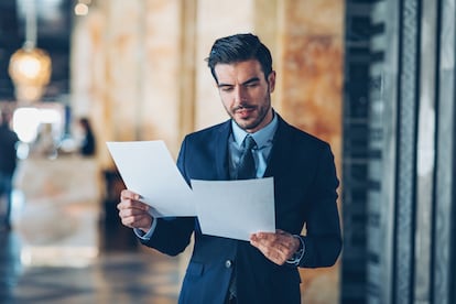 Businessman holding documents