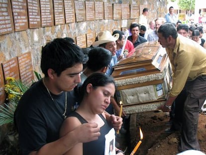 Relatives of Rufina Amaya, the sole survivor of the 1981 El Mozote massacre, carry her coffin after her eventual death in 2007. 