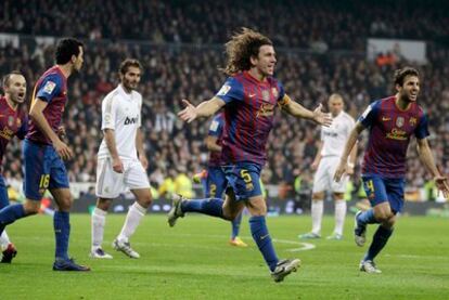 Puyol celebrates the strike that drew Barcelona level.