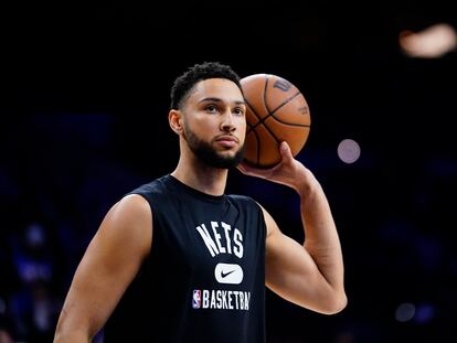 Brooklyn Nets' Ben Simmons watches practice before an NBA basketball game, Thursday, March 10, 2022, in Philadelphia.