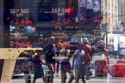 Stock market information displayed at the Nasdaq MarketSite in New York, US, on Monday, Aug. 5, 2024.