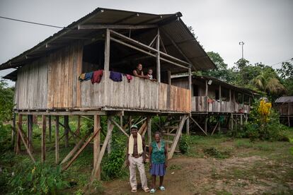 Pedro Bautista and his family at the entrance of his house, on June 16, 2024. 