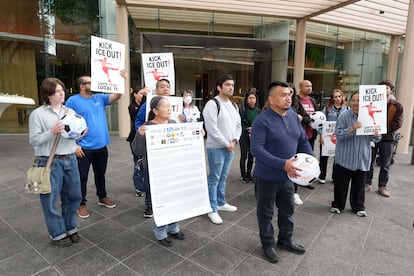 Immigrant rights advocates and unions protest outside the FIFA Committee offices in Los Angeles on May 27.