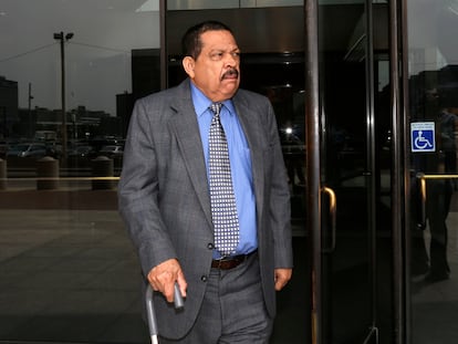 In this Aug. 22, 2013 file photo, former El Salvadoran military colonel Inocente Orlando Montano walks out of federal court in Boston.