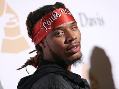 Fetty Wap arrives at the 2016 Clive Davis Pre-Grammy Gala at the Beverly Hilton Hotel, Feb. 14, 2016, in Beverly Hills, Calif.