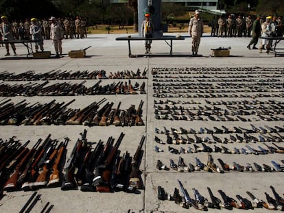 Mexican military displays guns confiscated from drug trade in Tijuana.