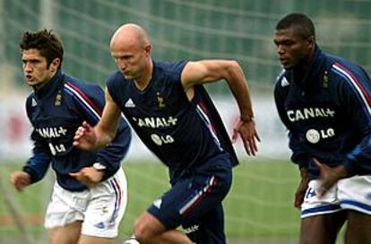 Los franceses Lizarazu, Leboeuf y Desailly, durante el entrenamiento de ayer.