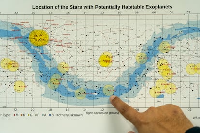 Abel Méndez points to a map in his office at the University of Puerto Rico in Arecibo.