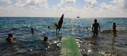 Bathers at the Sa Trinxa club on Las Salinas beach in Ibiza.