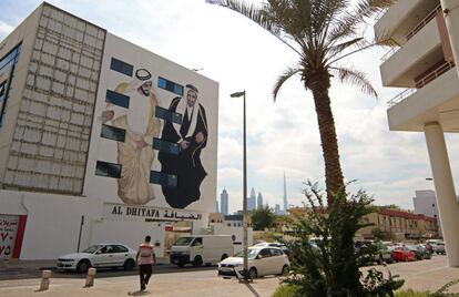 A picture taken on February 6, 2017 shows graffiti by Emirati muralist Ashwaq Abdullah, paying homage to founders of the United Arab Emirates, sheikhs Rashed Al Maktoum and Zayed Al Nahyan, on a wall of Dubai's 2nd of December street, which is part of the government-funded Dubai Street Museum project.

 
The streets of Dubai may be known for architectural superlatives like Burj Khalifa, the highest of the world's high-rises, and the Middle East's largest shopping centre Dubai Mall. But a group of street artists now also wants to turn the concrete walls of a fast-growing urban sprawl into an open-air museum that celebrates Emirati heritage and speaks to everyone in the multicultural city.

 / AFP PHOTO / NEZAR BALOUT / RESTRICTED TO EDITORIAL USE - MANDATORY MENTION OF THE ARTIST UPON PUBLICATION - TO ILLUSTRATE THE EVENT AS SPECIFIED IN THE CAPTION