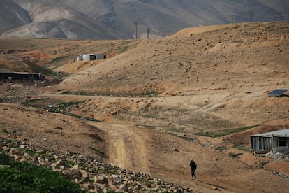 A girl returns home from school in the village of Al-Mu'arrajat, the scene of constant attacks by Jewish settlers.