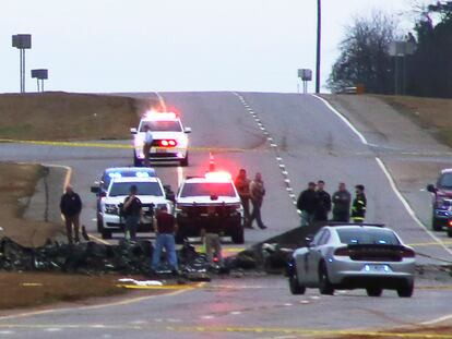 Law enforcement work at the scene of a Black Hawk helicopter crash Wednesday, Feb. 15, 2023, in the unincorporated community of Harvest, Ala. U.S. military officials say two people on board the helicopter, which was from the Tennessee National Guard, were killed.