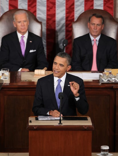 El presidente de EE UU durante su alocución, con Biden (i.) y Boehner de fondo.