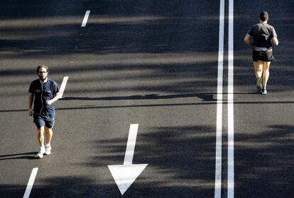 Joggers on the Paseo de la Castellana, in Madrid, on Sunday.