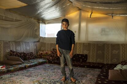 Jihad, 11, says he works hard at school, but he was a better student in Syria because he could concentrate more there. The school was an actual building and not a tent, and his head was clearer –war and the future did not fill his thoughts. Despite this, the young Syrian said he is determined to work hard to become a doctor so he can cure people of their sicknesses. He also likes to enjoy himself, playing football (that he is “good at”), hide and seek and riding his bicycle. While his family lost everything when they fled their home in Derik, Syria, for Qushtapa refugee camp in Erbil, Kurdistan region of Iraq in August 2013, Jihad’s father said his children’s future mean everything to him. “I would give my flesh so they could have all they need,” Jihad’s father, Hissam said. Hissam has organised to resettle his family in Europe in two months, believing “society there is more interested in children.” #WithSyria #Notnumbers.People Photographer: Eduardo Soteras Jalil