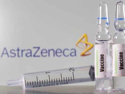 A test tube labelled with the Vaccine is seen in front of AstraZeneca logo in this illustration taken, September 9, 2020. REUTERS/Dado Ruvic