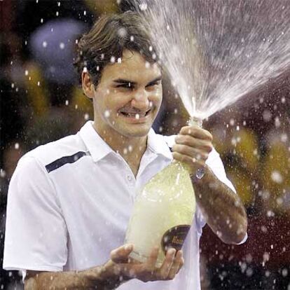 Roger Federer celebra el triunfo en el Masters Series de Madrid.