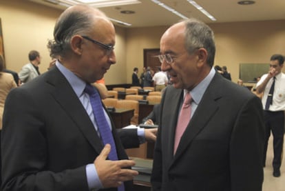 Cristóbal Montoro y Miguel Ángel Fernández Ordóñez, en la Comisión de Economía y Hacienda.