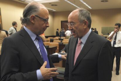 Cristóbal Montoro y Miguel Ángel Fernández Ordóñez, en la Comisión de Economía y Hacienda.