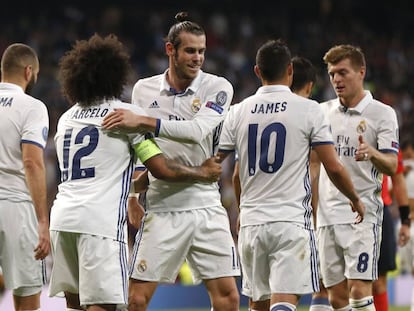 Los jugadores del Real Madrid celebrando un gol en un partido de Champions.