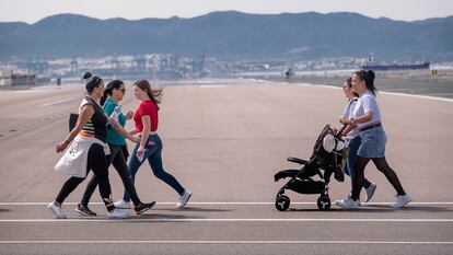 Passers-by on a street in Gibraltar after the obligatory outdoor use of masks was lifted. 