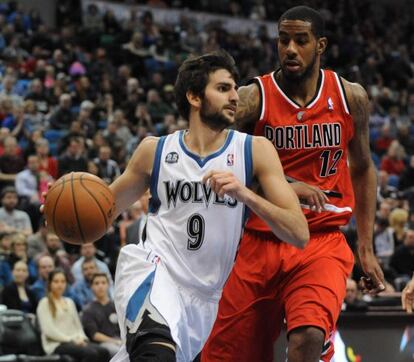 Ricky Rubio (9) y LaMarcus Aldridge (12).