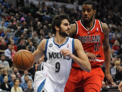 Ricky Rubio (9) y LaMarcus Aldridge (12).