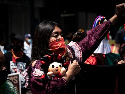 Integrantes del EZLN y el CNI