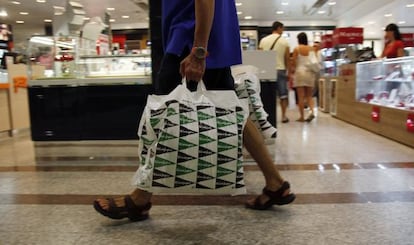 A customer in one of the many branches of El Corte Ingl&eacute;s, the Spanish chain of department stores. 