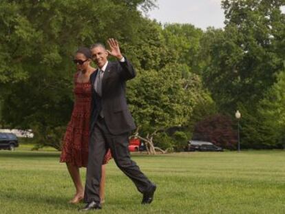 Barack Obama junto a sua esposa Michelle, nesta segunda-feira em Washington.