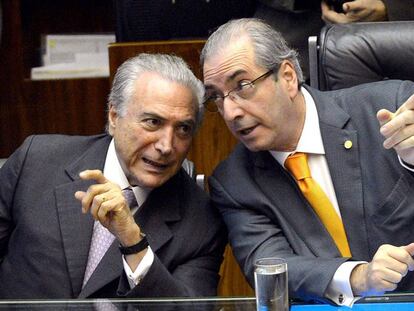 Michel Temer (left) speaking with then-speaker Eduardo Cunha.