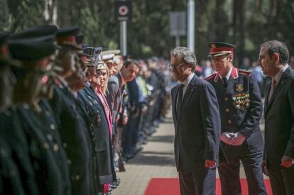 El president Mas amb el conseller Espadaler i el comissari Trapero.