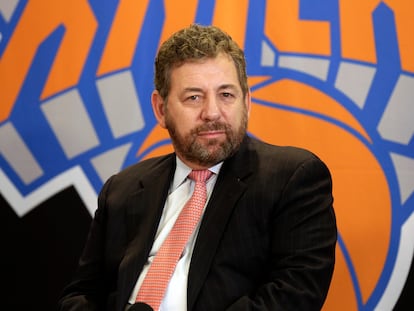 New York Knicks owner James Dolan listens to a question during a news conference on March 18, 2014, in New York.