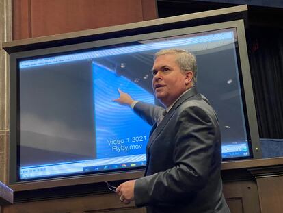 Scott Bray, Deputy Director of Naval Intelligence, pointing at a flying object during the hearing.