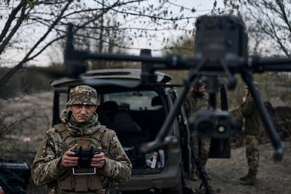 A Ukrainian soldier launches a drone in the area of the heaviest battles with Russian troops in Bakhmut, Donetsk region, Ukraine, on April 9, 2023.