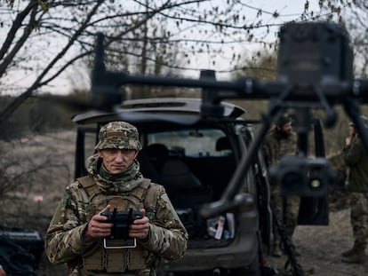 A Ukrainian soldier launches a drone in the area of the heaviest battles with Russian troops in Bakhmut, Donetsk region, Ukraine, on April 9, 2023.