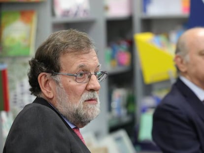 Mariano Rajoy y Jorge Fernández Díaz el pasado octubre durante la presentación del libro del exministro del Interior.