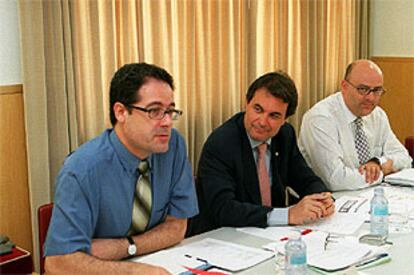 Artur Mas, en el centro, junto a Pere Macias y Lluís Corominas, en una foto de archivo.