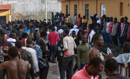 Would-be migrants gather in the courtyard of a temporary holding center in Melilla.