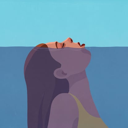 Woman gasping for air above water
